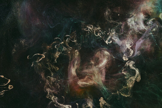 Luxurious abstract dark background. Explosive colors wallpaper, outer space pattern. Dynamic paint backdrop.
