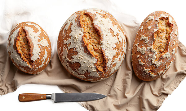 Bread sourdough loaf Three fresh crusty loaves on a beige cloth isolated on a transparent background for bakery design