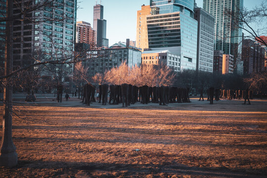 Chicago Skyline at Sunset With Agora Sculpture in Urban Park and Winter Trees