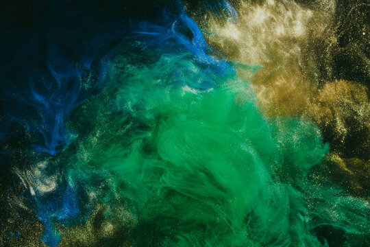 Abstract colorful green smoke on black background. Moving flow of paints, fluid liquid art, space sky