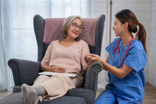 Healthcare interaction nurse engaging with elderly patient in home environment compassionate care warm atmosphere
