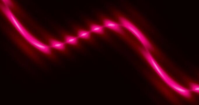 A dynamic and visually striking abstract animation features vibrant, glowing green light trails moving gracefully and energetically across a deep, dark background. The luminous patterns fluidly shift 