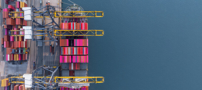 Aerial view Container cargo ship loading unloading container import export sea port, Global trade business container cargo ship freight shipping commercial trade logistic transportation international.