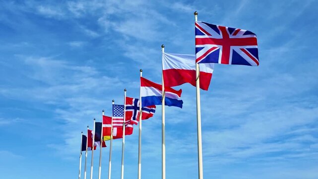 International Flags Waving in the Wind for Global Business, Diplomacy, and World News Backgrounds