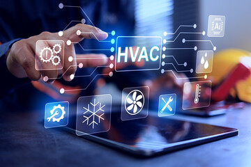 HVAC heating ventilation air conditioner concept with engineer pointing on virtual interface to command a cooling and ventilating the system