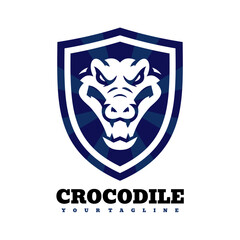 Fototapeta premium Crocodile Shield Logo Mascot Emblem — Fierce Blue Sports Team Crest and Brand Identity Design