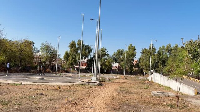 rto driving test track with circular road markings and poles in training ground