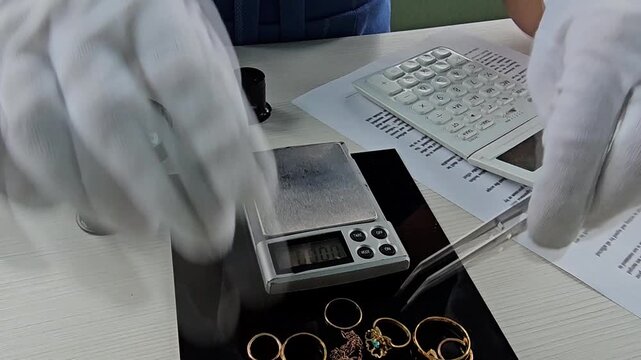 Jewelry testing and weighing process at a lab facility in a busy city