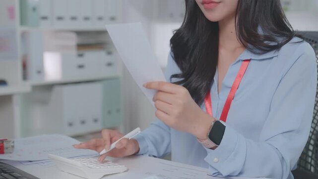 Expenses finance credit. Credit cost budget. writing on a calendar and using a calculator. Accountant, hands with calculator, expenses or bills.  audit for economic market, tax assessment planning.