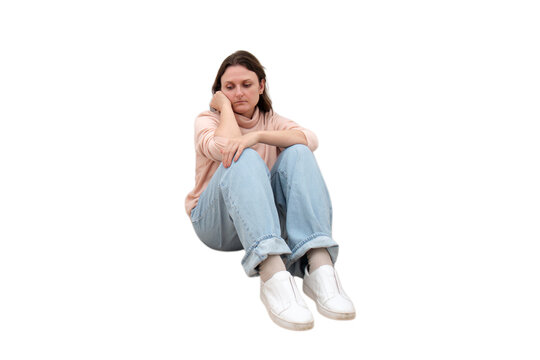 Sad woman sitting on floor isolated on transparent background. Depressed female person feeling lonely and unhappy. Concept of mental health problems, stress, anxiety and psychological support.