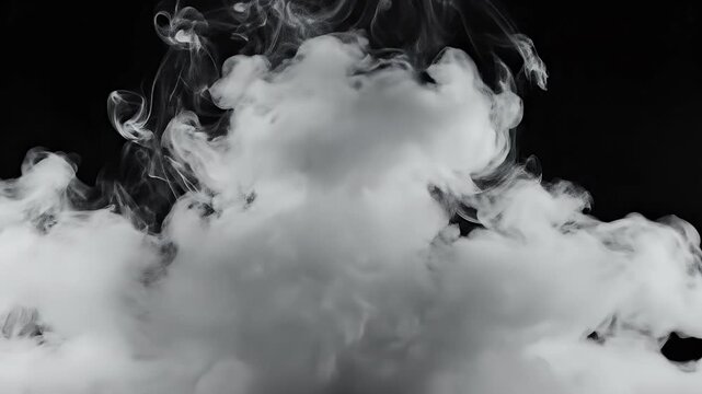 White Cloud of Smoke on Black Background - The video features a dense, white cloud of smoke or vapor against a stark black background.