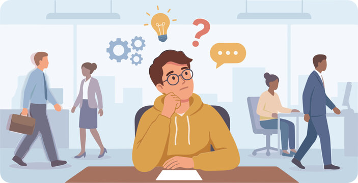 Man sitting at desk in office thinking with coworkers around