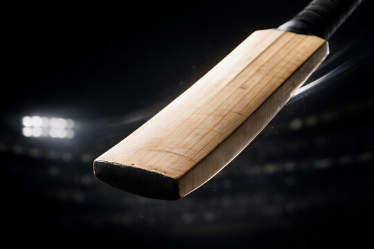 Close-up of Wooden Cricket Bat Under Stadium Lights &ndash; Sports Equipment Concept