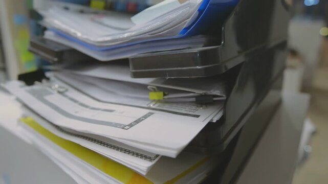 Office Document Files Stacked in Plastic Folder Close Up Business Paperwork Concept
