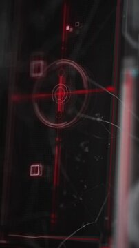 Vertical animation of futuristic heads up display with red crosshair for targeting or aiming on dark background
