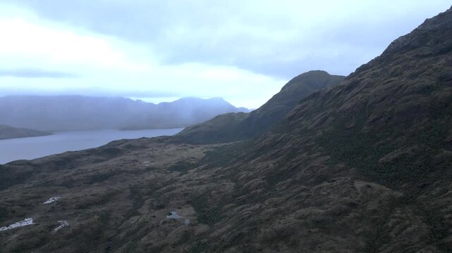 Calbuco chile patagonia river lake nature mountain trees clouds winter dusk morning drone