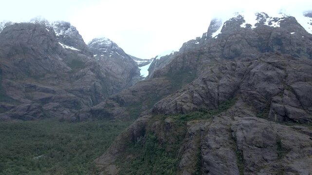 Calbuco chile patagonia river lake nature mountain trees clouds winter dusk morning drone