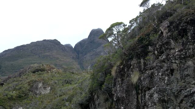 Calbuco chile patagonia river lake nature mountain trees clouds winter dusk morning drone