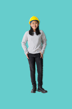 Smiling Young Girl Wearing Safety Helmet stands confidently,  symbolizing careers in engineering, construction, STEM education. Transparent background