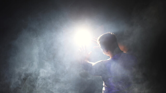 Search for truth: hand stretching to luminous beam
