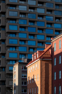 Apartment residential building facade architecture featuring modern tower windows in Stockholm Sweden with repeating grid pattern and daylight