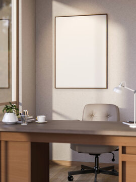White frame on wall over wooden table and beige swivel chair in office room and sunlight from window