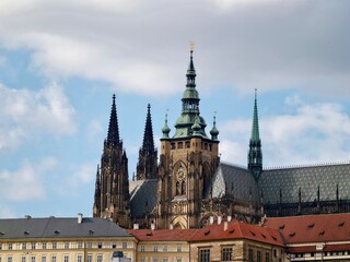Obraz premium Ancient Gothic spires rise. Majestic religious buildings adorned with elaborate decorative elements