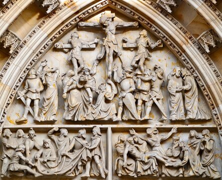 Decorative religious sculpture. Intricate high relief carving depicting crucifixion scene in cathedral