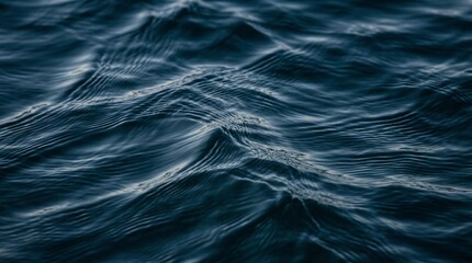 Obraz premium Texture of dark waves of blue sea water in ocean
