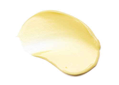 glossy cream texture, light yellow brushstroke on a white background