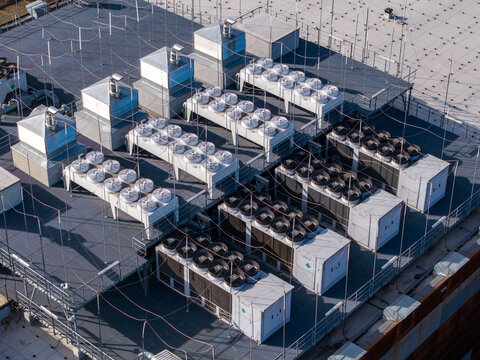 Aerial view of a data center with multiple hvac cooling systems for server and compute grid infrastructure, Warsaw, Masovian Voivodeship, Poland.