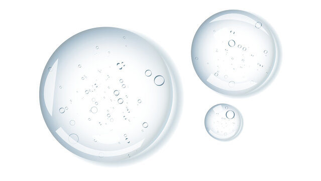 A few drops of transparent cosmetic product on top of the background.