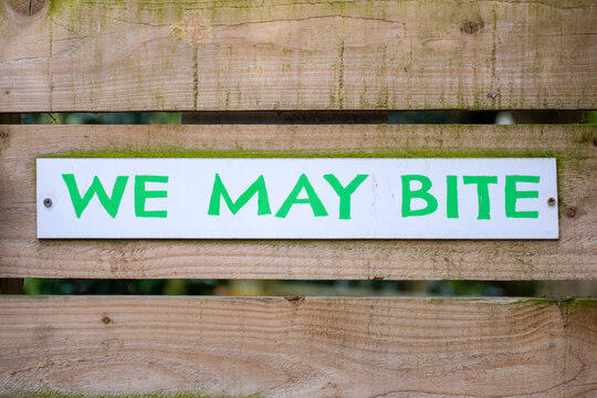 We May Bite Sign