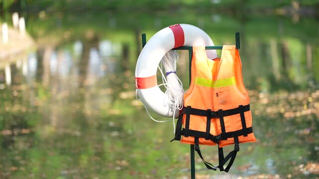 Life vest life ring water safety rescue gear orange vest floating device safety equipment emergency aid life jacket life preserver flotation rescue