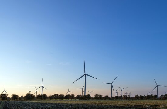 Landscape with windturbines in rural landscapes in Germany. Green and sustainable energy.