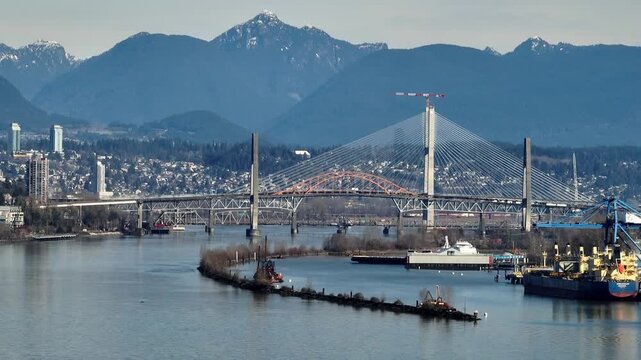 New Stal̕əw̓asəm (Riverview) Bridge Running Alongside The Old Pattullo Bridge Over The Fraser River In British Columbia, Canada. Aerial Shot