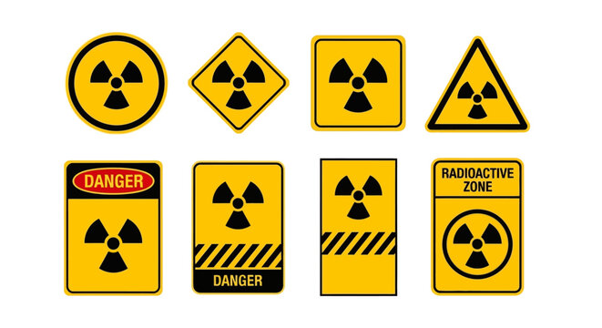 Radioactive warning signs display various symbols and labels.