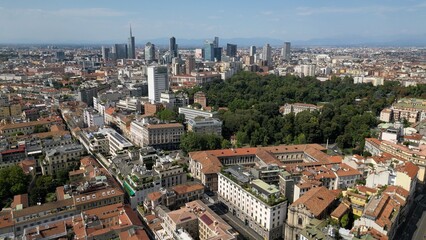 Obraz premium Europe, Italy, MIlan 03,30,2026 drone aerial view of Milan downtown fashion district , Corso Venezia , natural history museum and new skyline with skyscrapers in Gea Aulenti Garibladi 