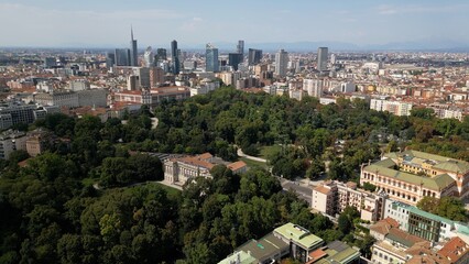 Obraz premium Europe, Italy, MIlan 03,30,2026 drone aerial view of Milan downtown fashion district , Corso Venezia , natural history museum and new skyline with skyscrapers in Gea Aulenti Garibladi 