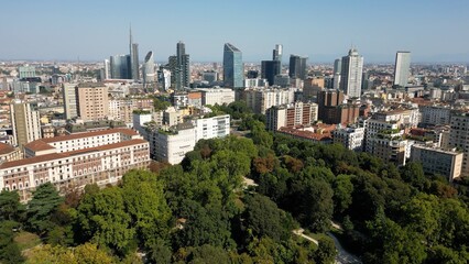 Fototapeta premium urope, Italy, MIlan 03,30,2026 drone aerial view of Milan downtown fashion district , Corso Venezia, Villa Reale , Montanelli urban park and new skyline Garibaldi Gae Aulenti with skyscrapers 