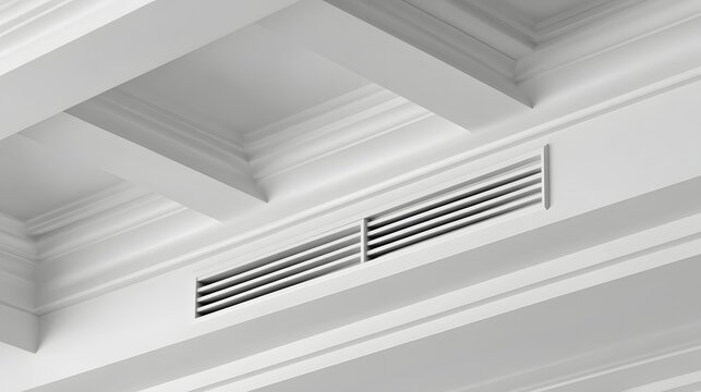 Office ceiling air vent with modern HVAC ventilation system in clean interior.
