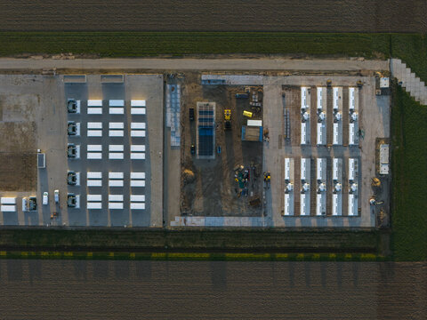 Aerial view of energy storage facility construction developing battery units netherlands