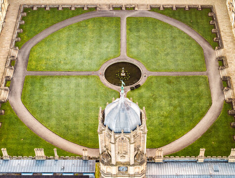 Aerial view of the circular lawn and fountain within Christ Church College's quadrangle, a symphony of green and stone textures, Oxford, England, United Kingdom.