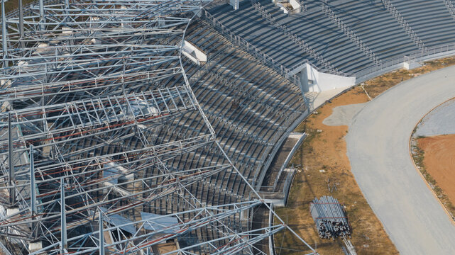 Aerial view of a stadium showing the contrast between the metallic structure and the smooth gray track, Muang Pattaya, Chang Wat Chon Buri, Thailand.