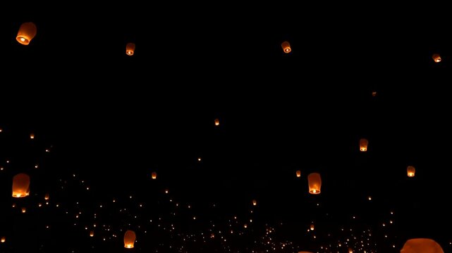 People release lanterns in the night sky with a crowd  (15)