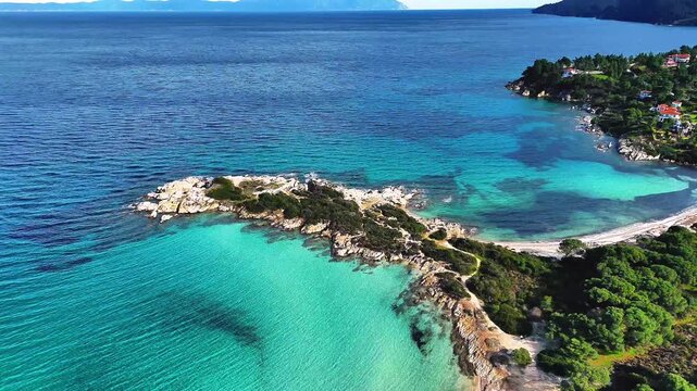 Aerial view of Karydi Beach in Vourvourou, Sithonia peninsula, Chalkidiki, Greece in spring offseason