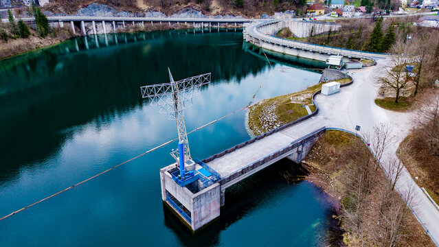Aerial view of the Staudamm Klaus dam reflecting the sky, a fusion of engineering and nature's palette, Klaus an der Pyhrnbahn, Oberosterreich, Austria.