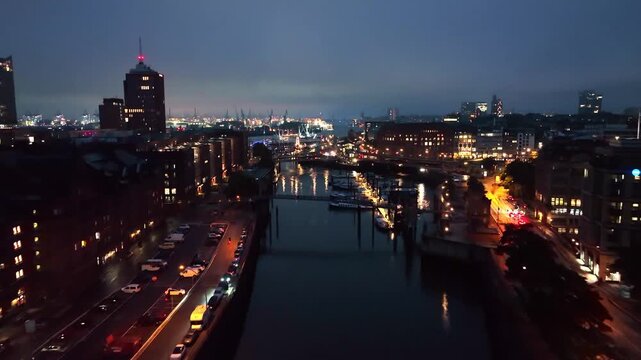 Cinematic aerial drone footage of Hamburg, showcasing its iconic harbor, modern skyline, canals, and historic architecture.