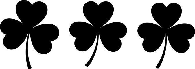 Obraz premium Set of three black silhouettes of clovers (shamrock). Vector illustration.