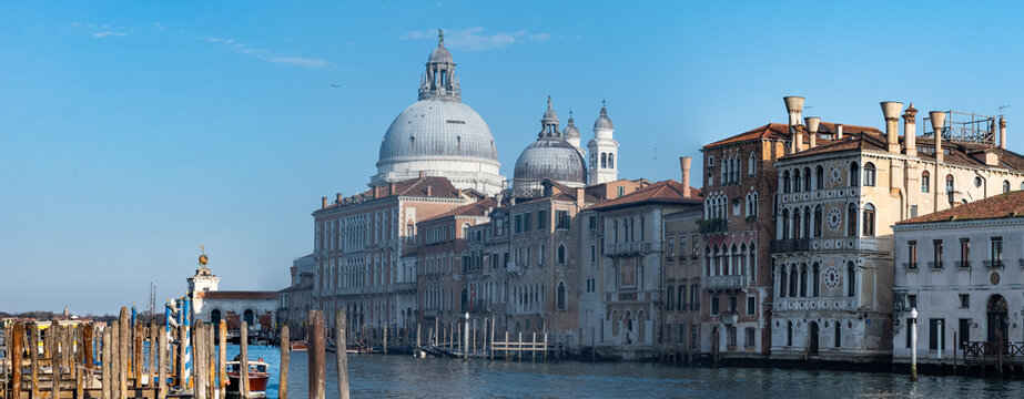 Morning light over historic domes and Venetian canal